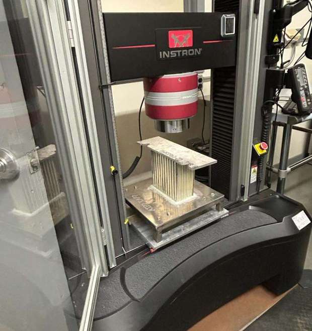 Aluminum honeycomb specimen in an Instron test frame