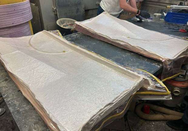 Foam molds under vacuum bag during cure
