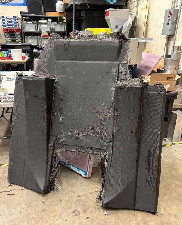 Trimmed carbon body panel
