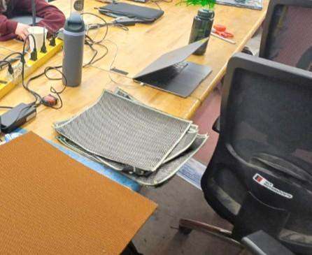 Stacked dry carbon fabric on a table